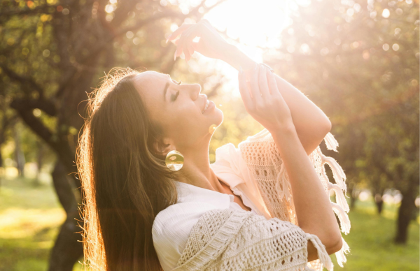Woman Enjoying Sunlight